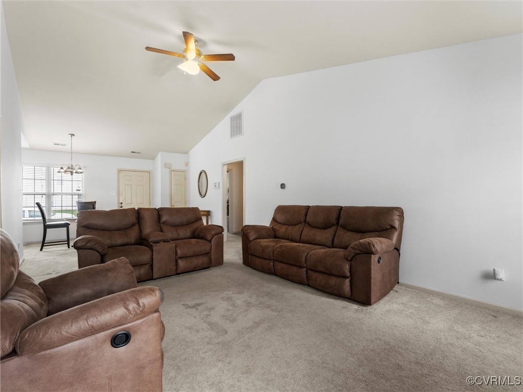3043 Amherst Ridge Way Colonial Heights, VA 23834 - Photo 8 of 27 Living area with a chandelier, a ceiling fan, ligh