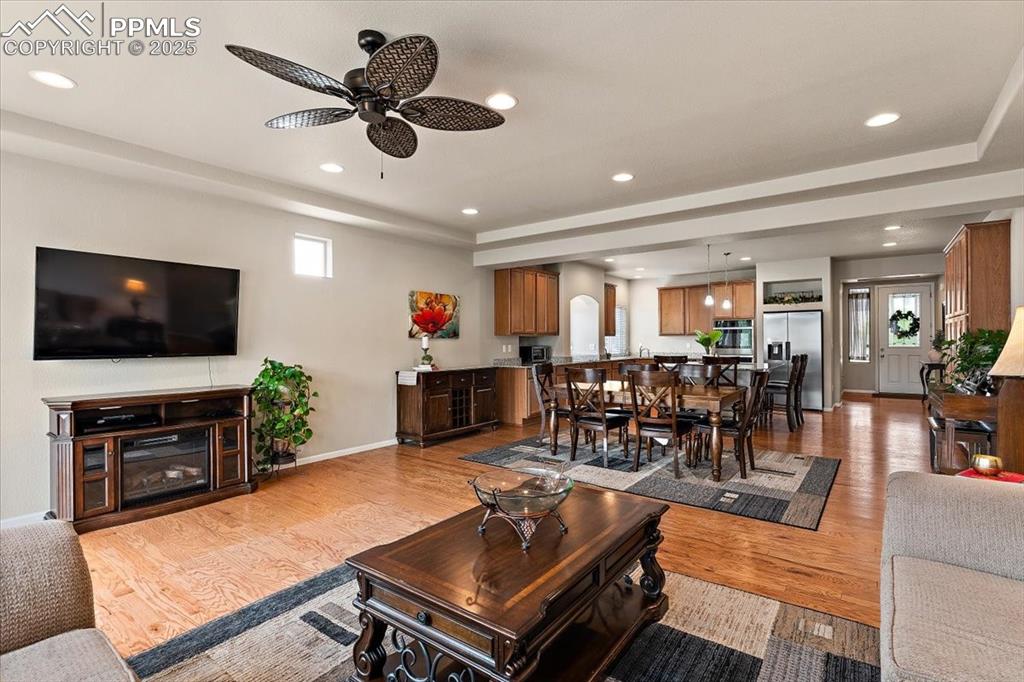 7890 Treehouse Terrace Fountain, CO 80817 - Photo 11 of 31 a living room with furniture and a flat screen tv