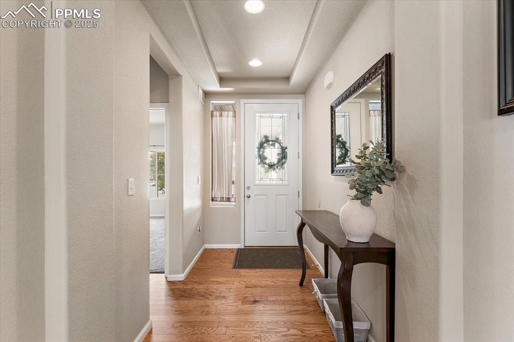 7890 Treehouse Terrace Fountain, CO 80817 - Photo 2 of 31 a view of a livingroom with wooden floor and furniture