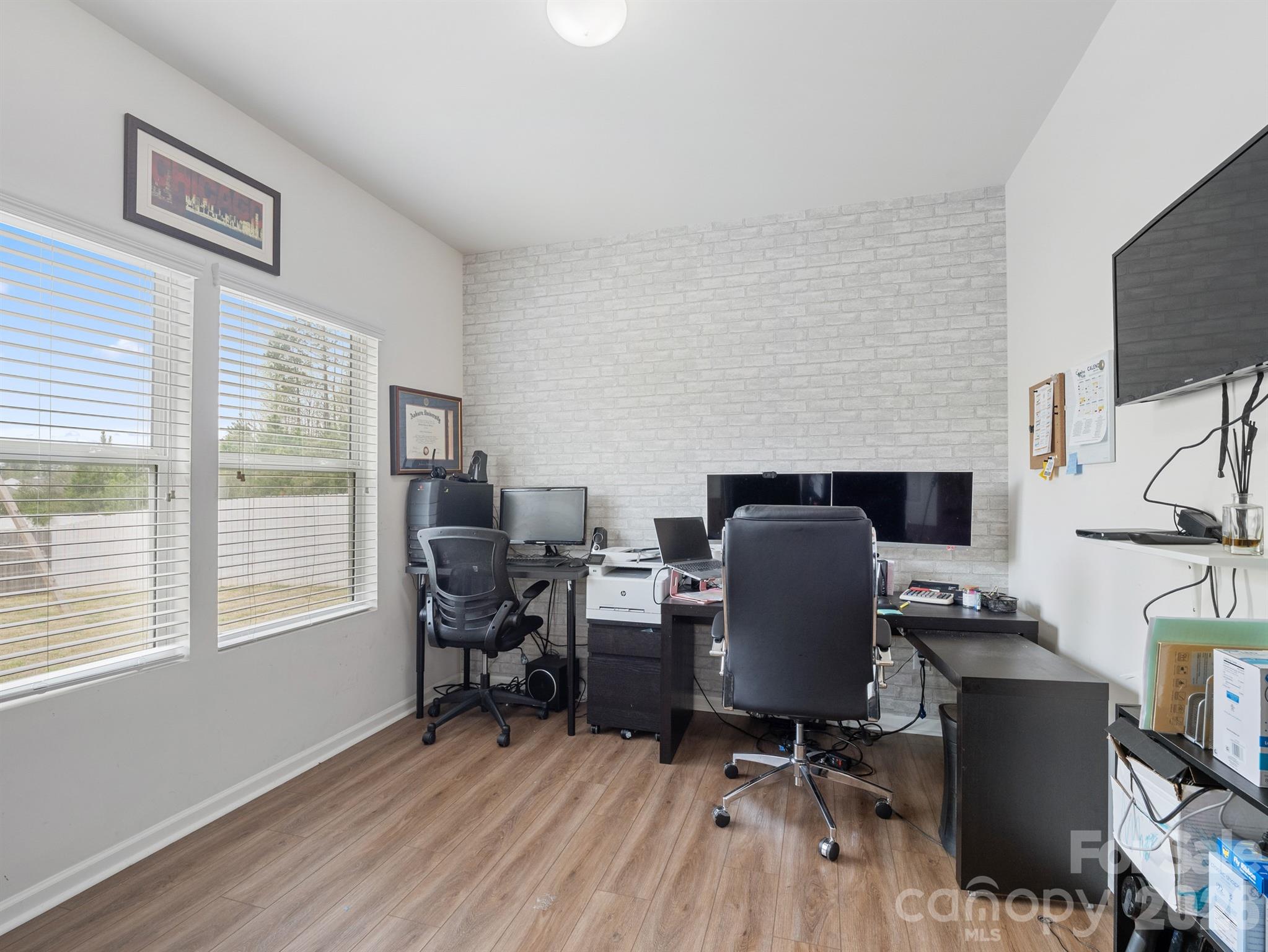 629 Gants Road York, SC 29745 - Photo 11 of 27 a workspace with furniture hardwood and a window