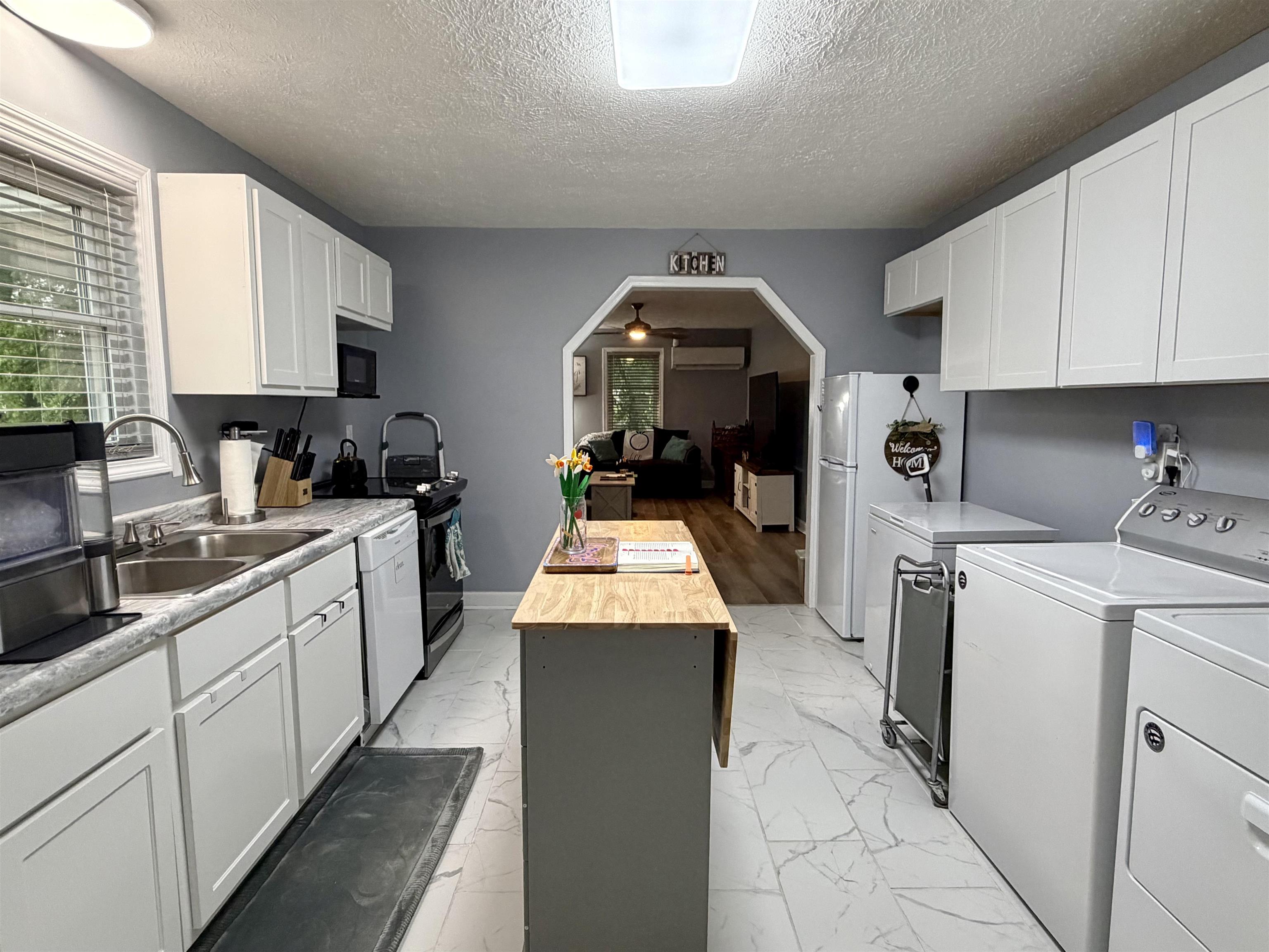 8022 45th Highway Ramer, TN 38367 - Photo 9 of 20 a kitchen with sink and cabinets