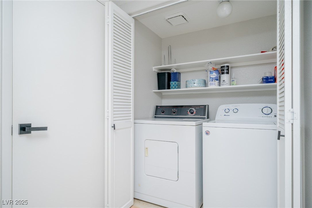 7950 West Flamingo Road, Unit 1173 Las Vegas, NV 89147 - Photo 27 of 31 Laundry room with independent washer and dryer and laundry area