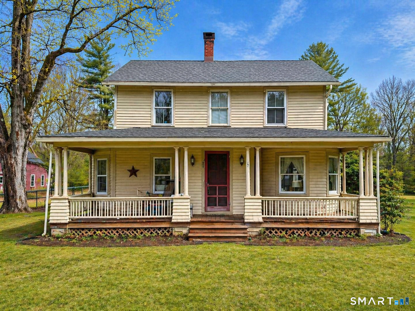 21 High Bridge Road Newtown, CT 06482 - Photo 1 of 14 front view of a house with a yard