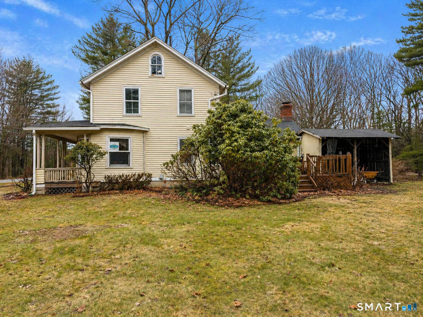 21 High Bridge Road Newtown, CT 06482 - Photo 4 of 14 a front view of a house with garden