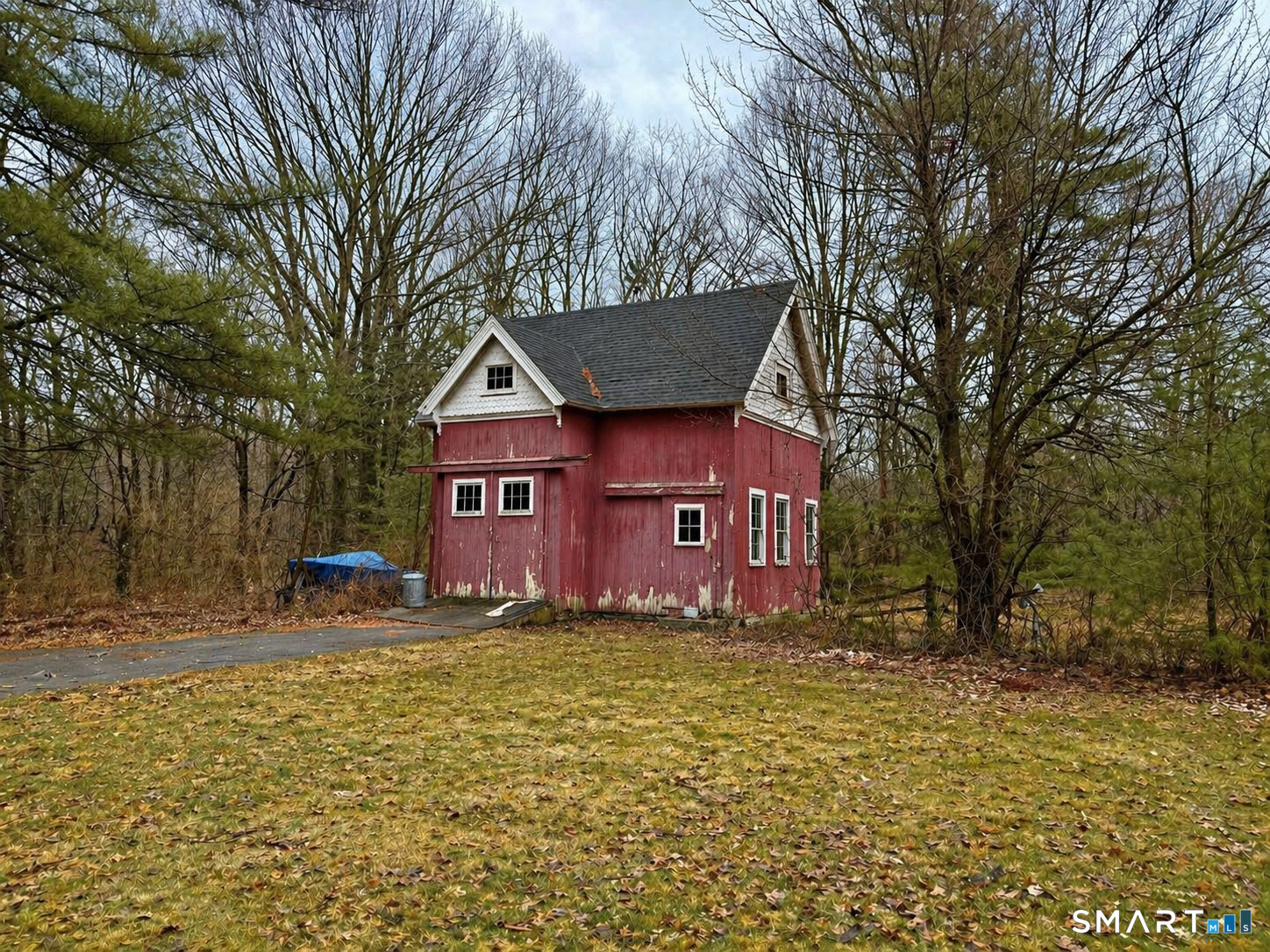 21 High Bridge Road Newtown, CT 06482 - Photo 5 of 14 a view of a house with a yard