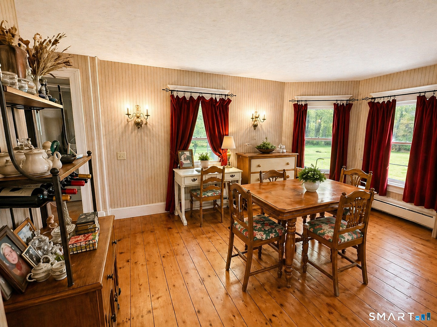 21 High Bridge Road Newtown, CT 06482 - Photo 6 of 14 a view of a dining room with furniture and chandelier