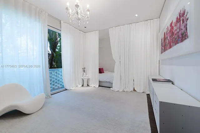 a view of livingroom with furniture and window