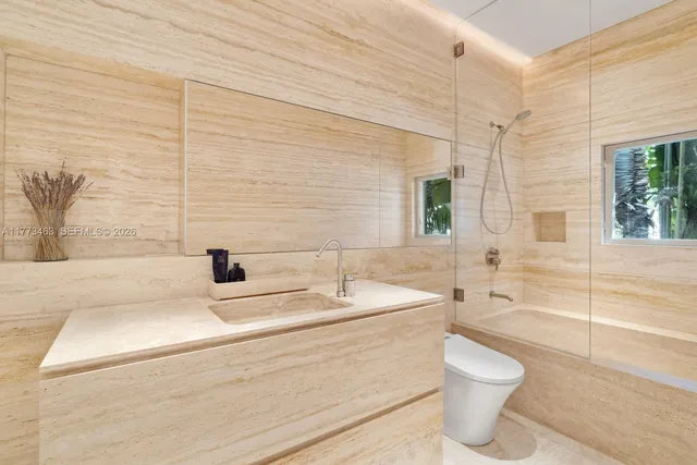 a bathroom with a sink and a toilet