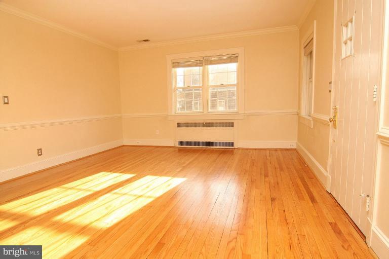 330 Hopkins Road Baltimore, MD 21212 - Photo 1 of 30 a view of a room with wooden floor and a window