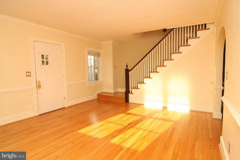 330 Hopkins Road Baltimore, MD 21212 - Photo 27 of 30 a view of an empty room with wooden floor