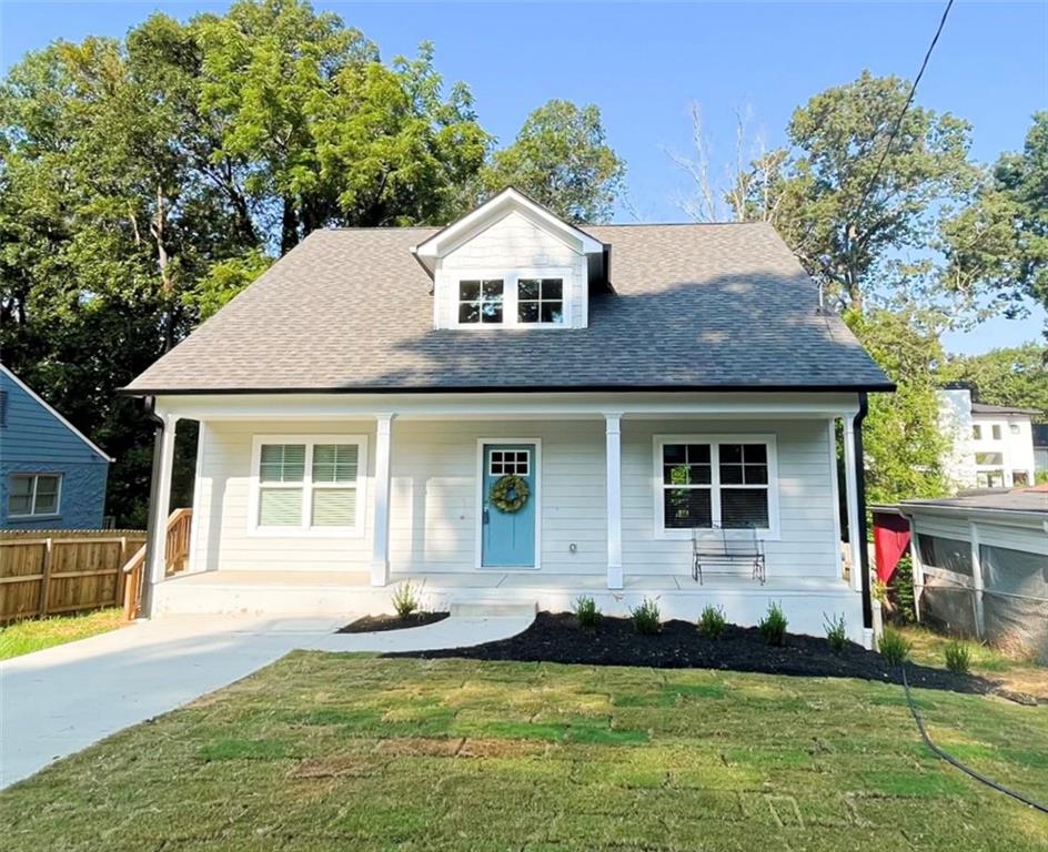 671 Daniel Avenue Decatur, GA 30032 - Photo 1 of 1 a front view of a house with a yard