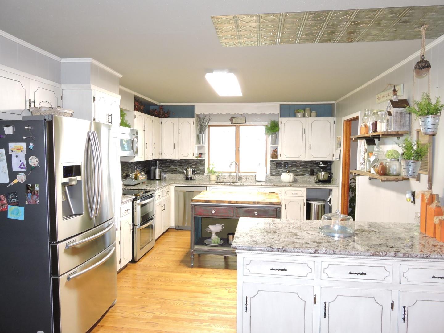 2142 Stephenson Road Hillsboro, TN 37342 - Photo 8 of 29 Kitchen with new granite and double oven. Kitchen appliances remain with the home.