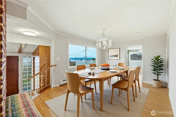 a view of a room with window and wooden floor
