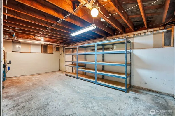 a view of a house with backyard porch and wooden fence