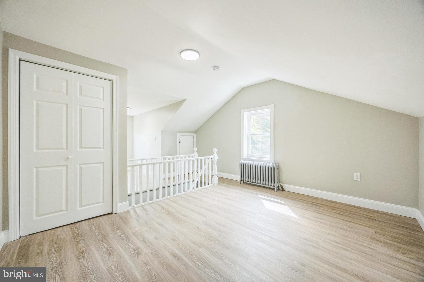 131 Columbus Avenue Trenton, NJ 08629 - Photo 10 of 12 a view of livingroom with hardwood floor and window