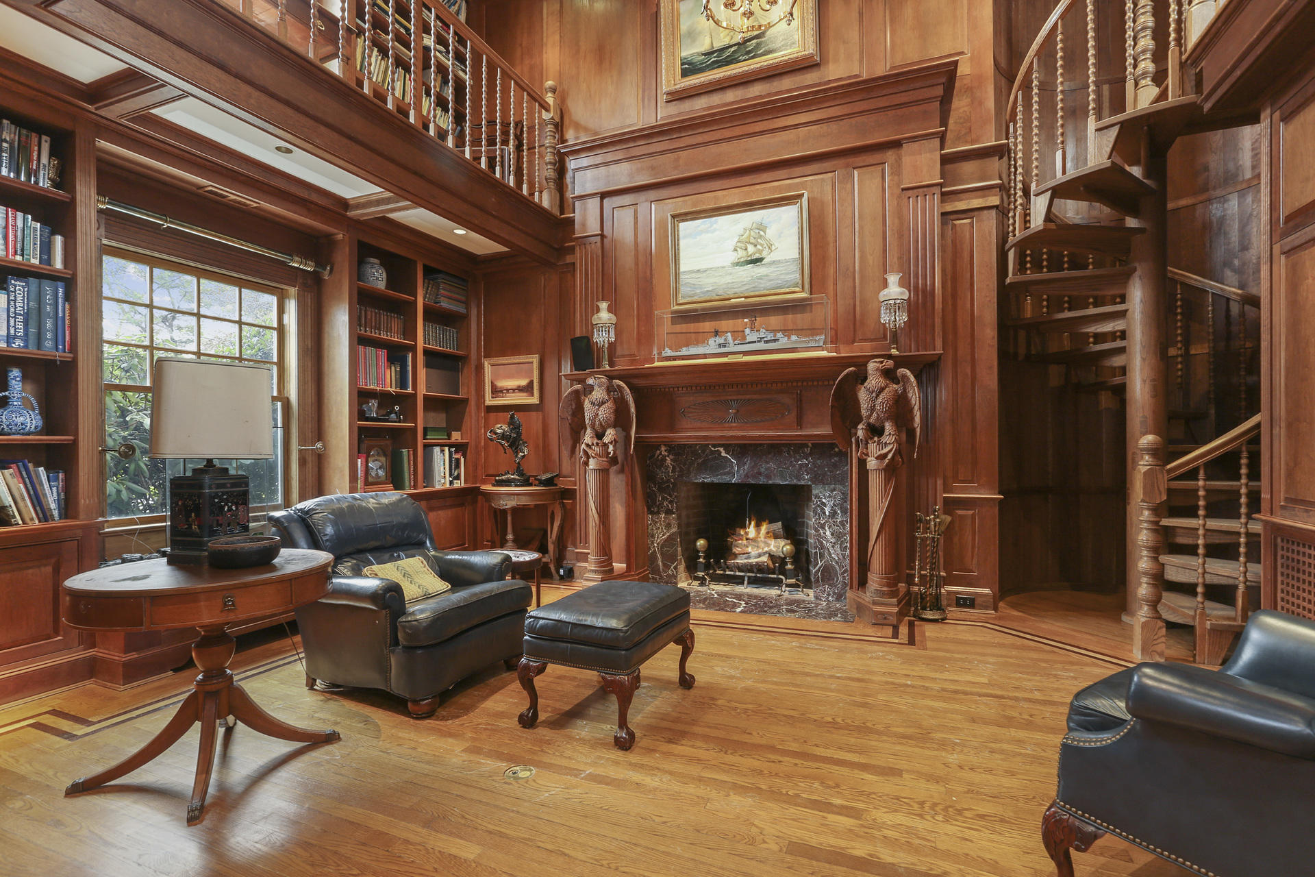 155 Long Neck Point Road Darien, CT 06820 - Photo 11 of 52 a living room with furniture and a fireplace