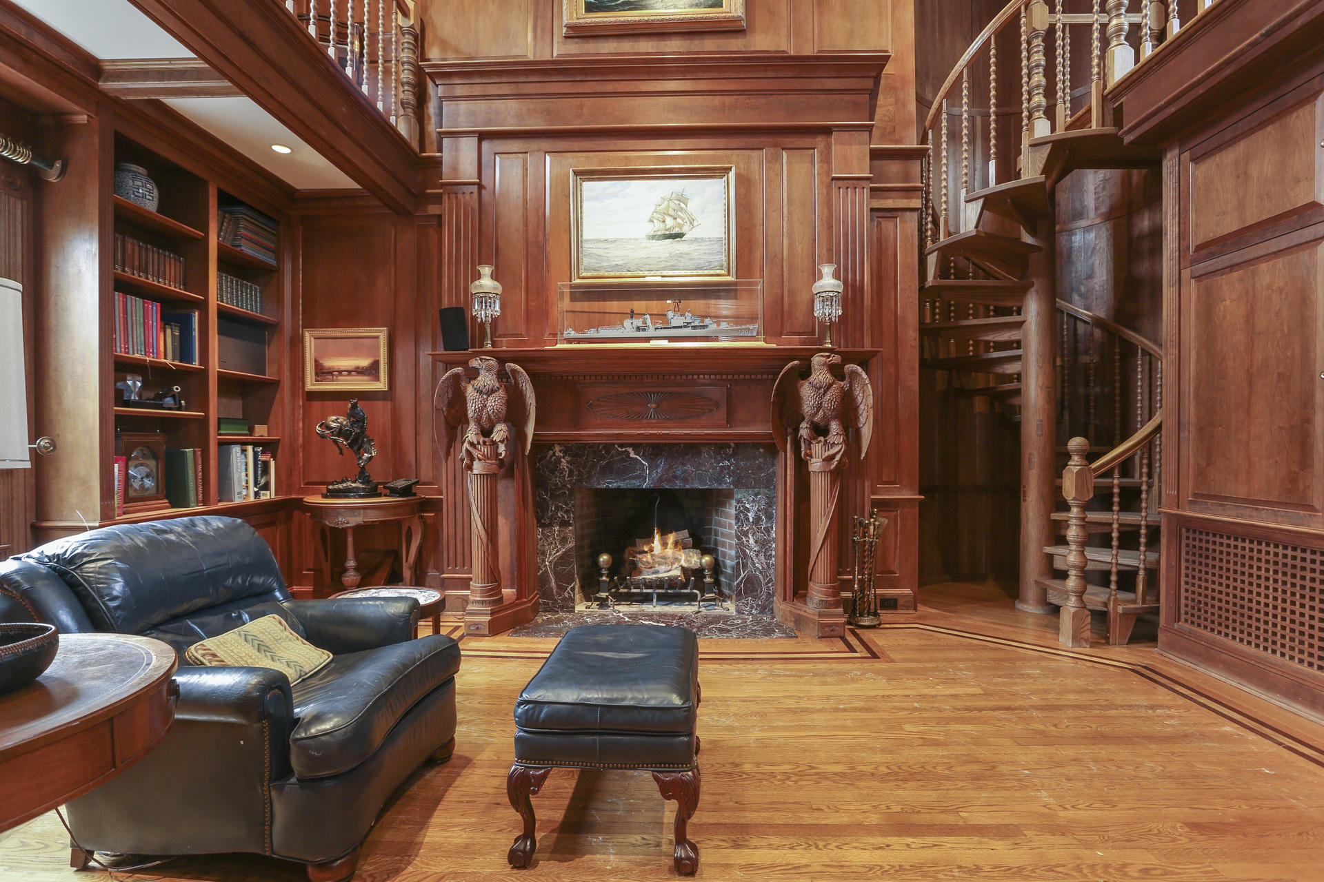 155 Long Neck Point Road Darien, CT 06820 - Photo 12 of 52 a living room with furniture and a fireplace