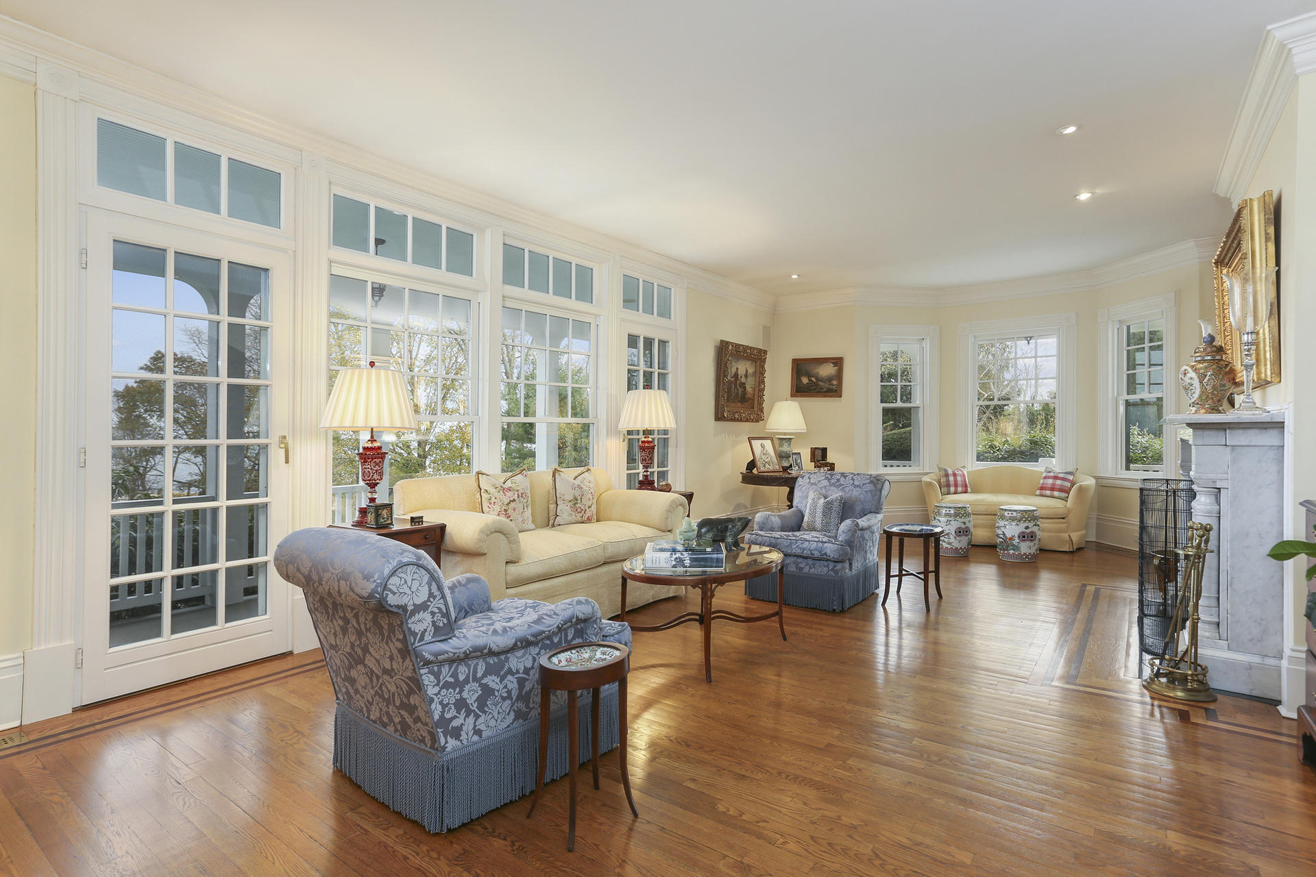 155 Long Neck Point Road Darien, CT 06820 - Photo 13 of 52 a living room with furniture and a large window