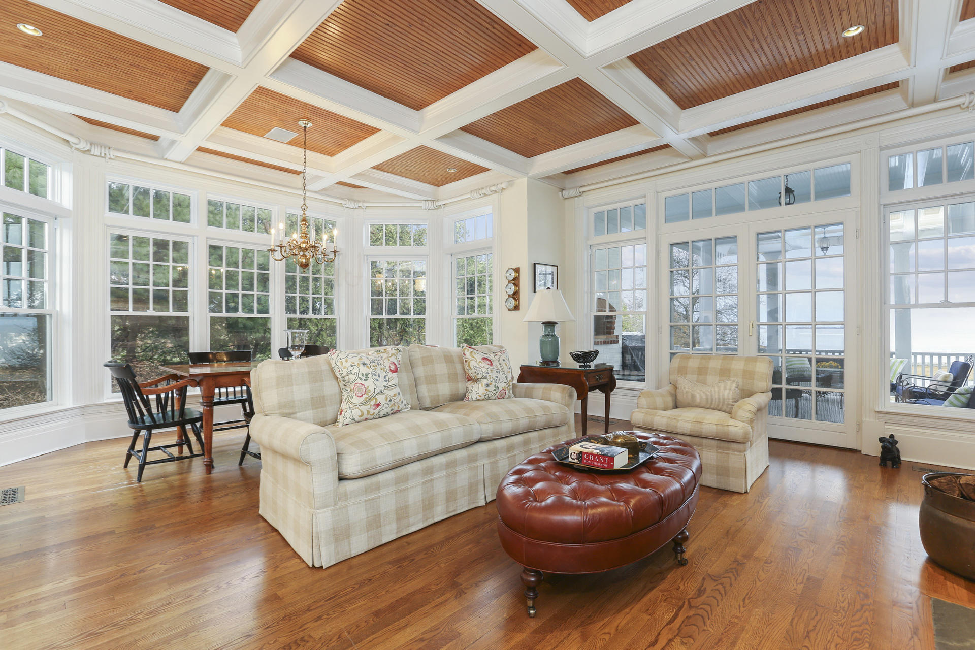 155 Long Neck Point Road Darien, CT 06820 - Photo 20 of 52 a living room with furniture and a large window