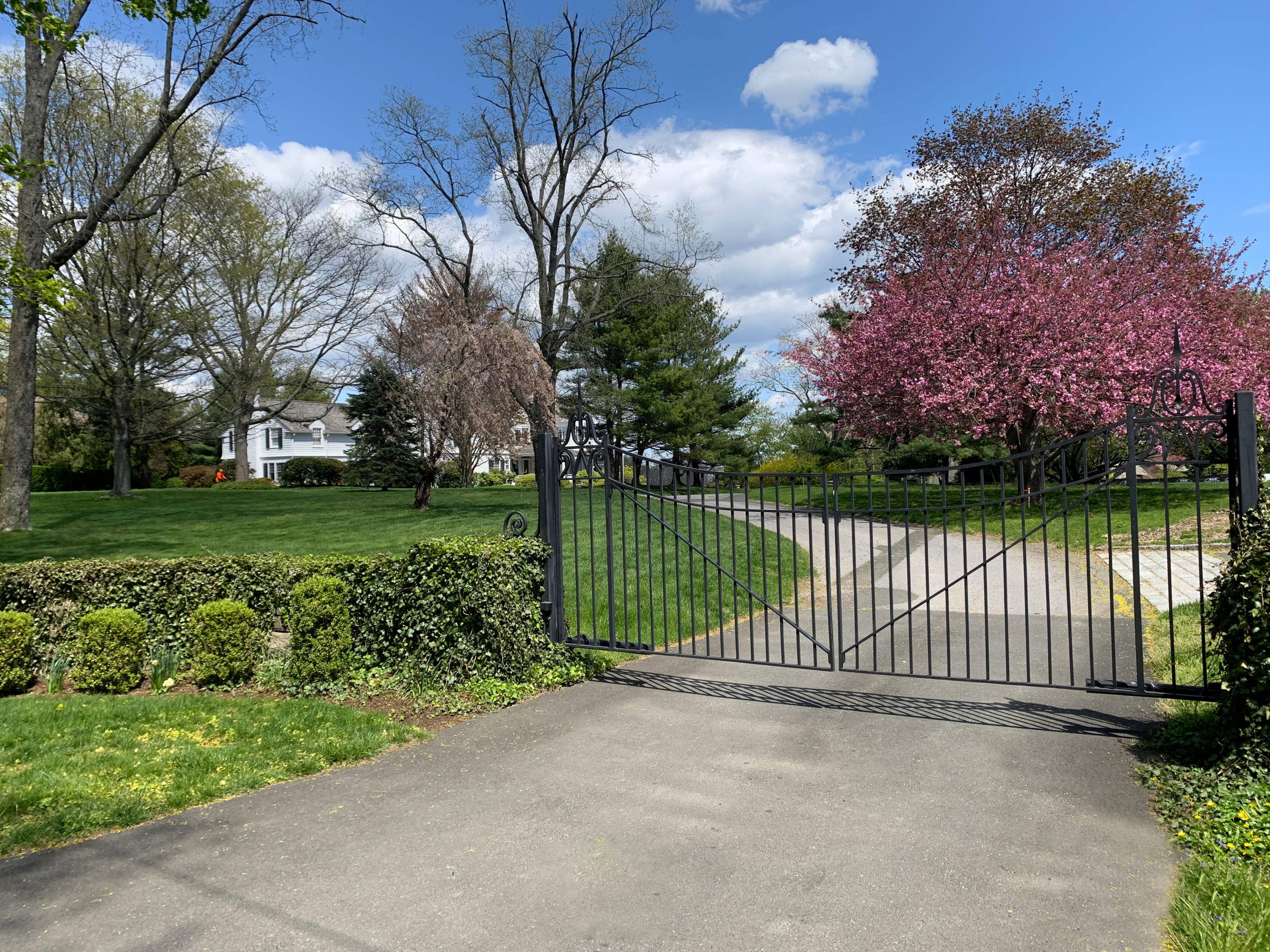 155 Long Neck Point Road Darien, CT 06820 - Photo 5 of 52 a view of a backyard with a lake view