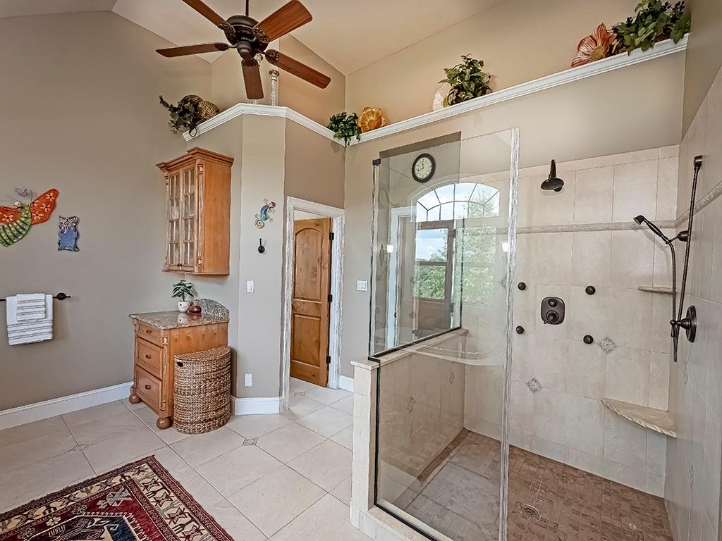 245 Reibold Road Renfrew, PA 16053 - Photo 14 of 25 a bathroom with a tub shower and mirror