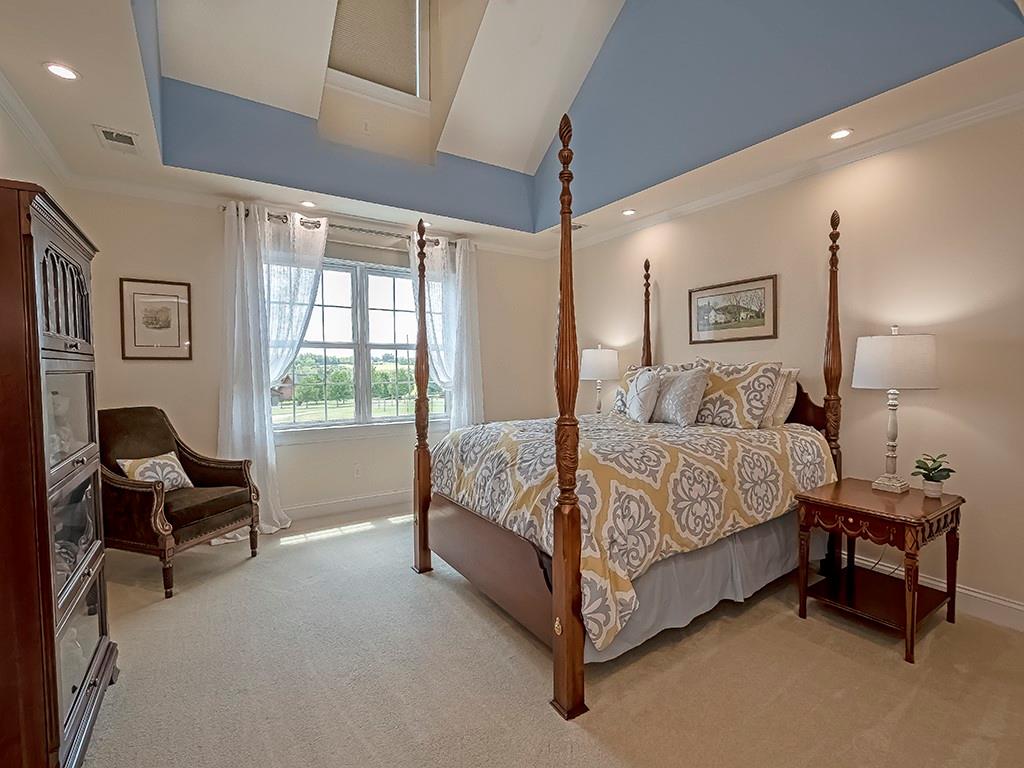 245 Reibold Road Renfrew, PA 16053 - Photo 15 of 25 a bed room with a bed and a chair
