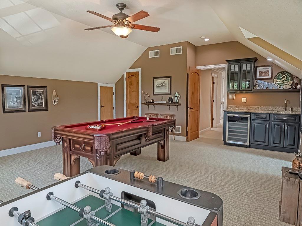 245 Reibold Road Renfrew, PA 16053 - Photo 18 of 25 a room with furniture and a chandelier