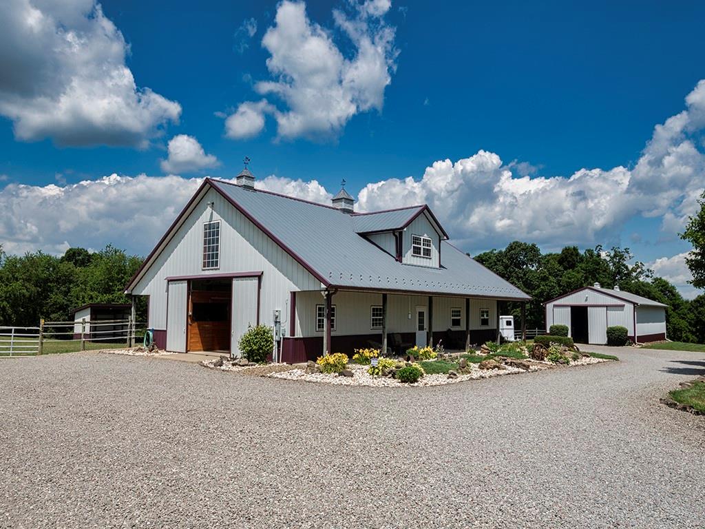 245 Reibold Road Renfrew, PA 16053 - Photo 22 of 25 a front view of a house with garden