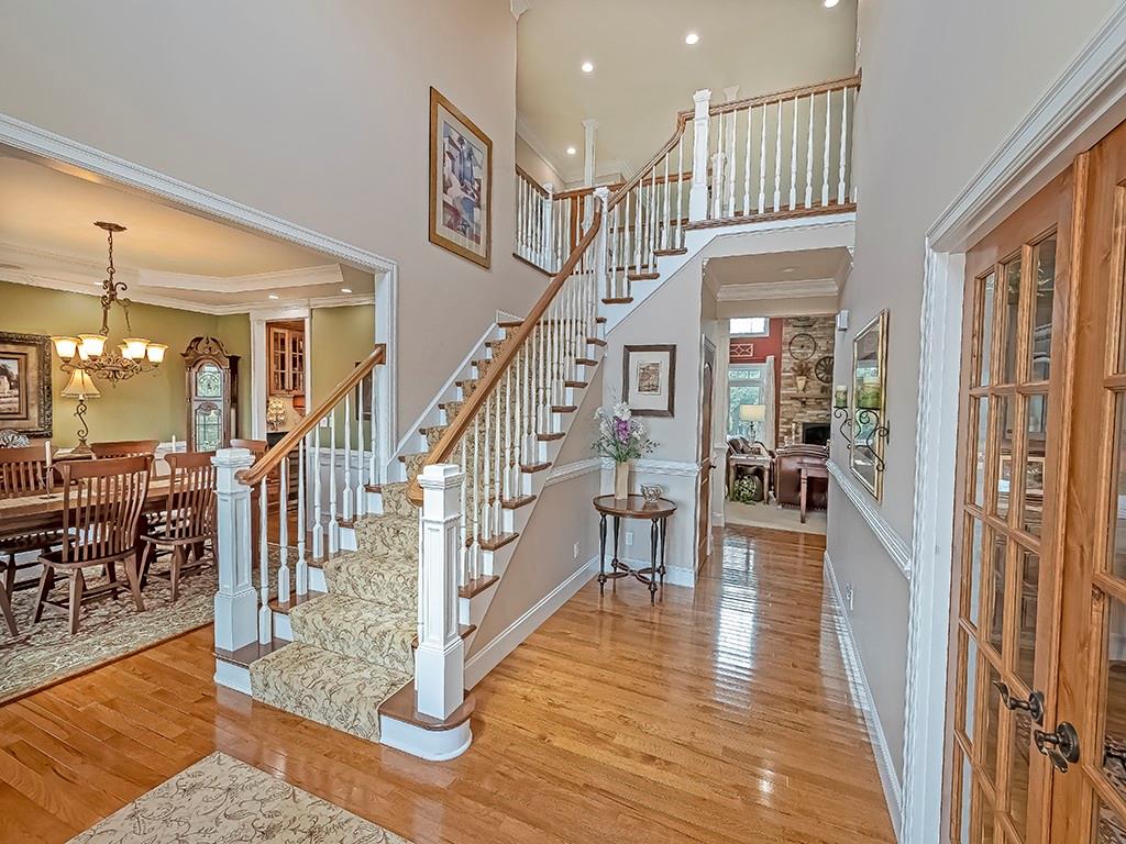 245 Reibold Road Renfrew, PA 16053 - Photo 3 of 25 a view of entryway and hall with wooden floor
