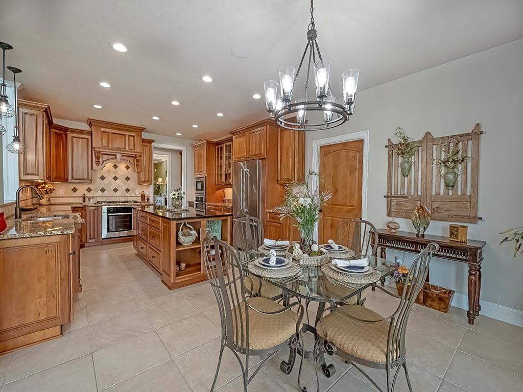 245 Reibold Road Renfrew, PA 16053 - Photo 8 of 25 a view of a dining room with furniture and chandelier