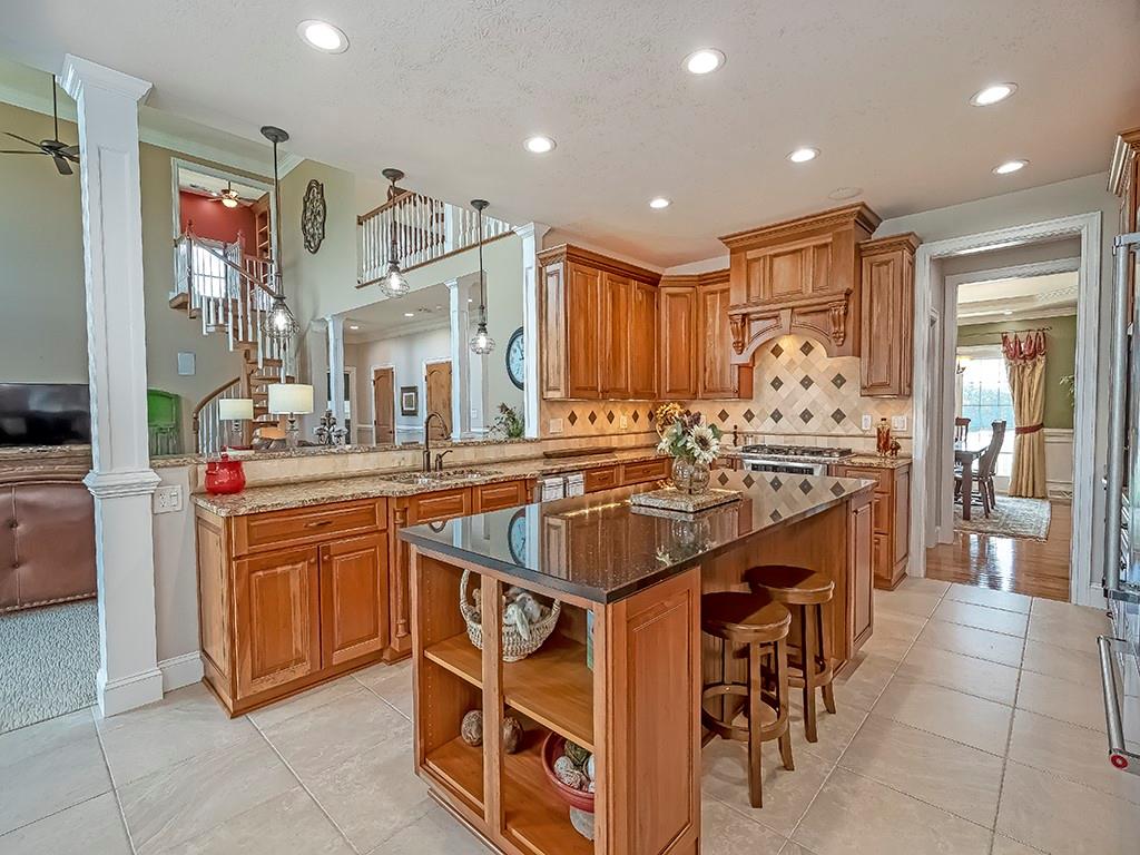 245 Reibold Road Renfrew, PA 16053 - Photo 9 of 25 a kitchen with stainless steel appliances granite countertop a sink and cabinets