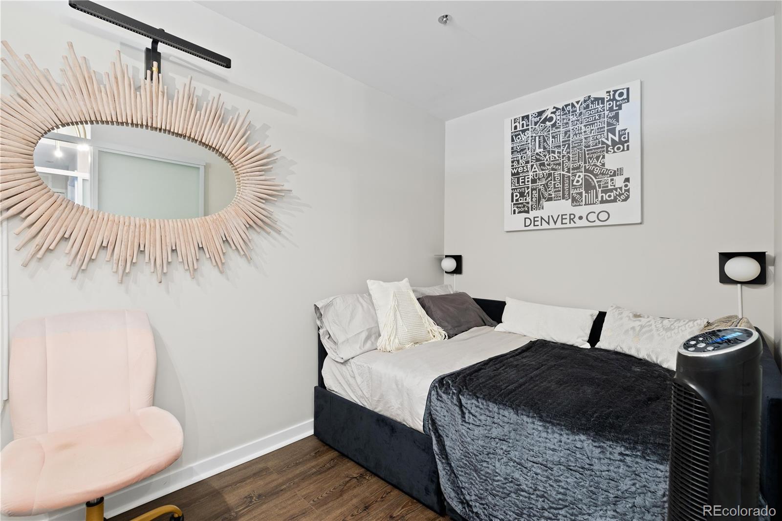 891 14th Street, Unit 4206 Denver, CO 80202 - Photo 20 of 49 a bedroom with a bed and a mirror
