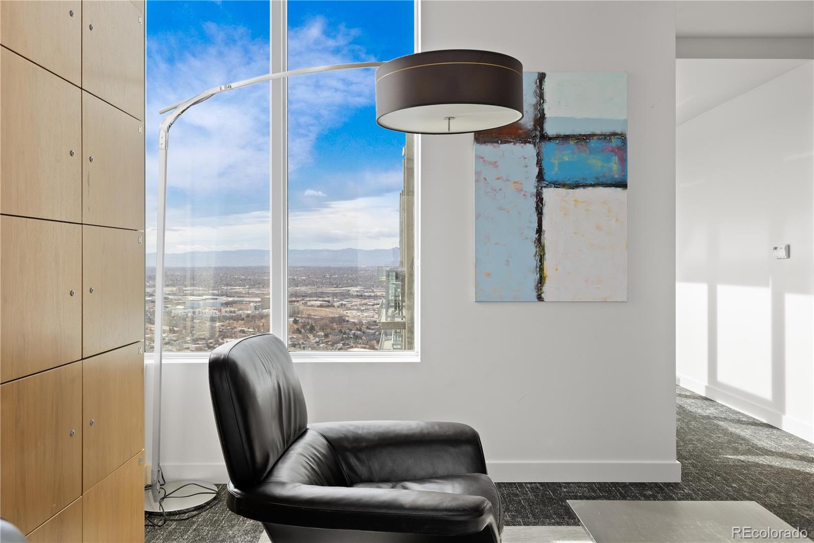 891 14th Street, Unit 4206 Denver, CO 80202 - Photo 29 of 49 a view of a livingroom with furniture and a window