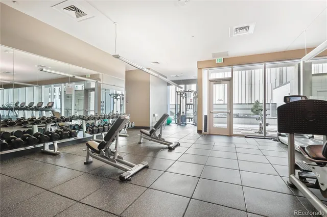a view of a swimming pool with outdoor seating