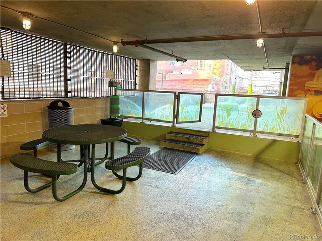 a view of a glass building with glass windows