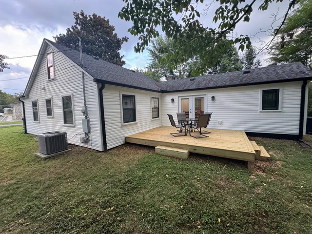 a view of a backyard with a patio