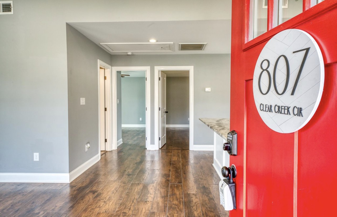 807 Clear Creek Road Pulaski, TN 38478 - Photo 3 of 17 a view of a hallway with wooden floor
