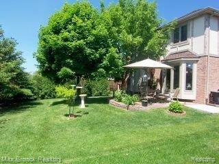 1003 River Mist Drive Rochester, MI 48307 - Photo 15 of 21 Landscaped privacy