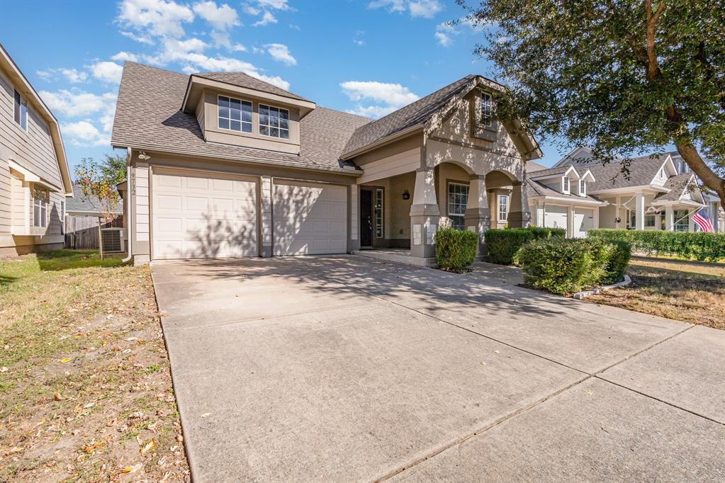 9732 Hedge Bell Drive McKinney, TX 75072 - Photo 2 of 24 a front view of a house with a yard