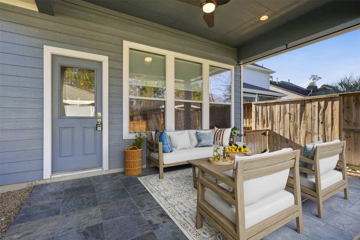 66 Whetstone Ridge Way Spring, TX 77382 - Photo 2 of 39 Virtually staged covered back patio to help give a visual for how the space could be utilized.