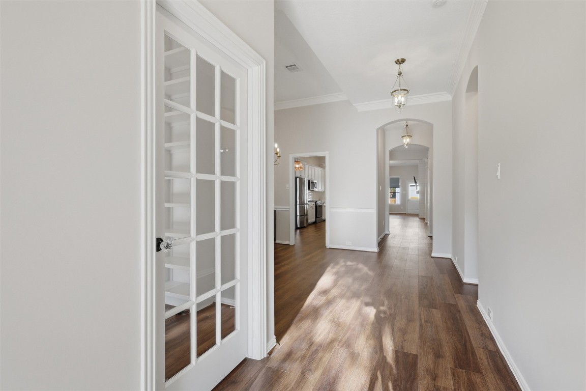 66 Whetstone Ridge Way Spring, TX 77382 - Photo 25 of 39 This is the view when entering the home through the front door. In 2024 luxury wide plank vinyl flooring was installed in the main living areas, bedrooms, and closets.