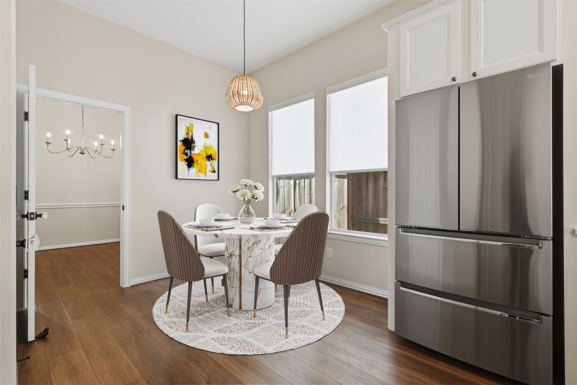 66 Whetstone Ridge Way Spring, TX 77382 - Photo 5 of 39 Virtually staged breakfast area shows an option of how the space could be utilized.