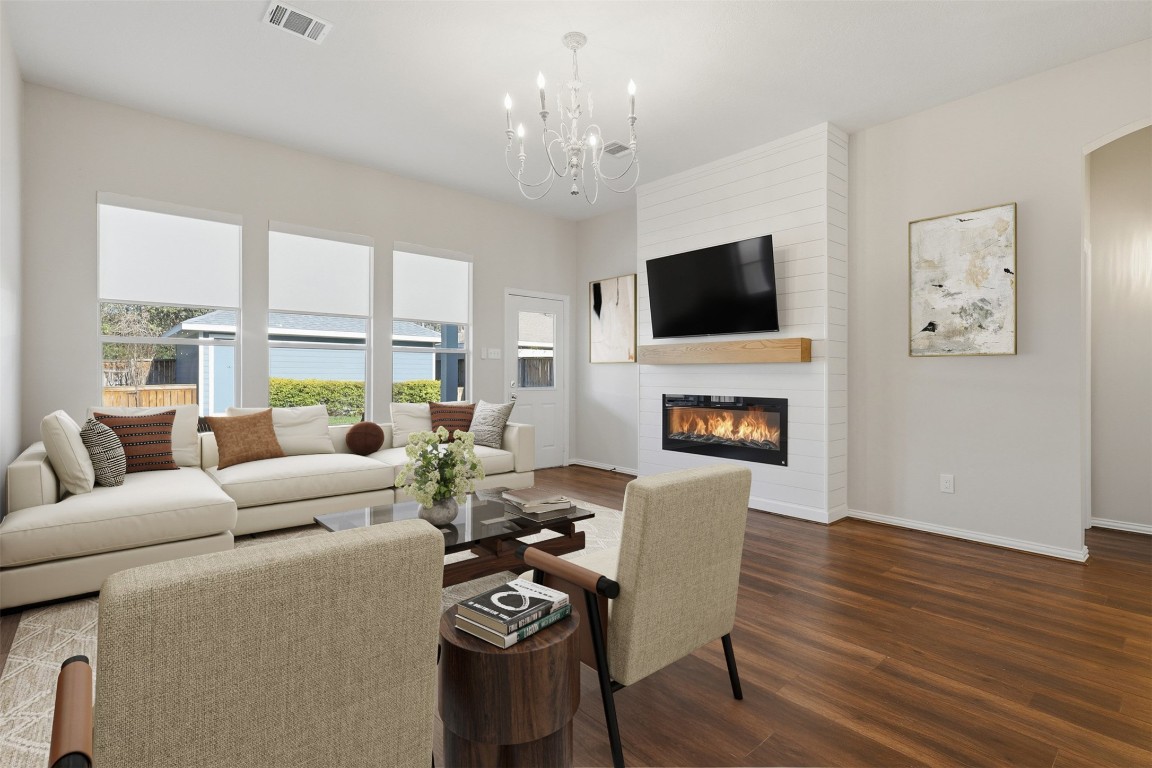 66 Whetstone Ridge Way Spring, TX 77382 - Photo 6 of 39 Virtually staged living room to help show options for furnishing the space.