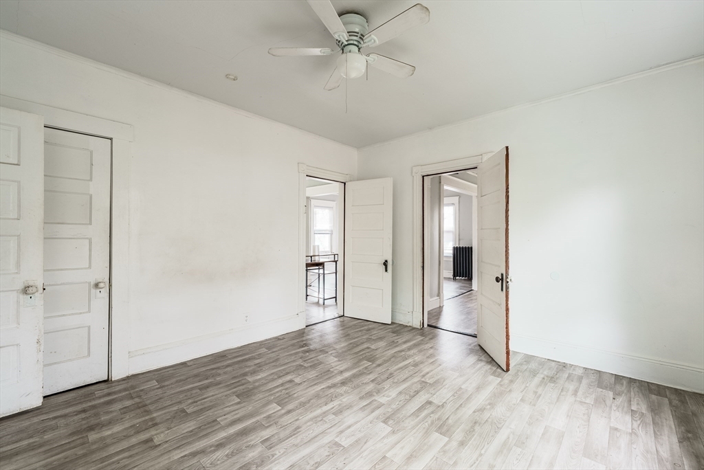 33 Littleton Street Springfield, MA 01104 - Photo 18 of 19 a view of an empty room with wooden floor