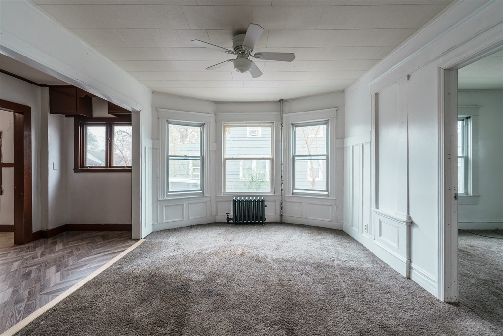 33 Littleton Street Springfield, MA 01104 - Photo 9 of 19 a view of an empty room with a window
