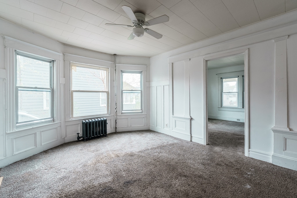33 Littleton Street Springfield, MA 01104 - Photo 10 of 19 a view of an empty room with a window