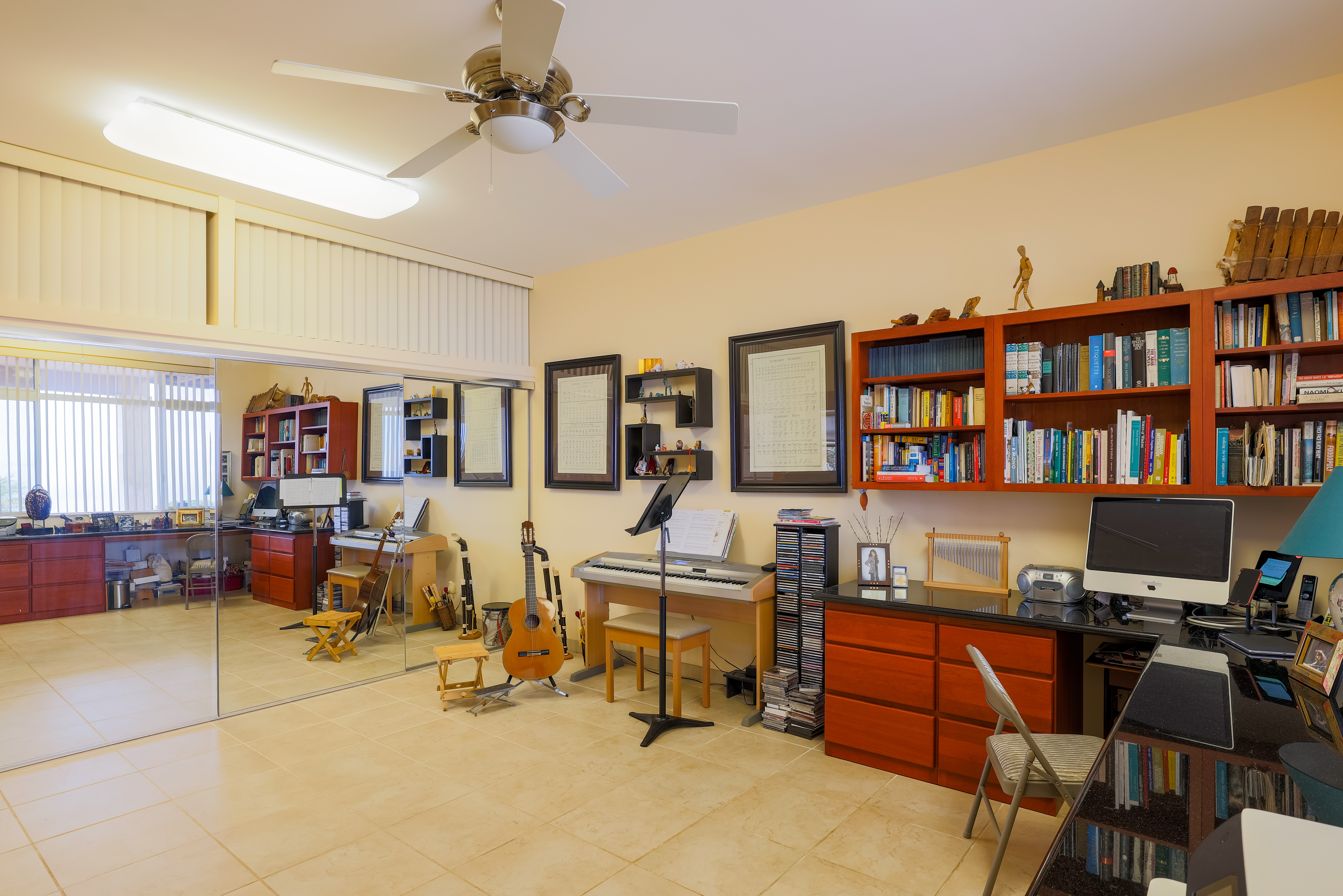 59-1638 Kohala Ranch Road Kamuela, HI 96743 - Photo 19 of 29 a view of a workspace with furniture and a book shelf