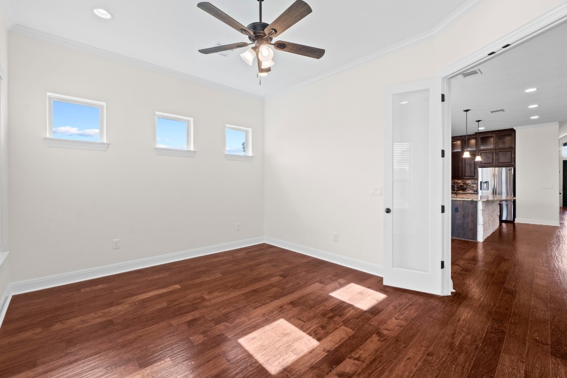 200 Tate Lane Round Rock, TX 78665 - Photo 21 of 40 a view of empty room with wooden floor