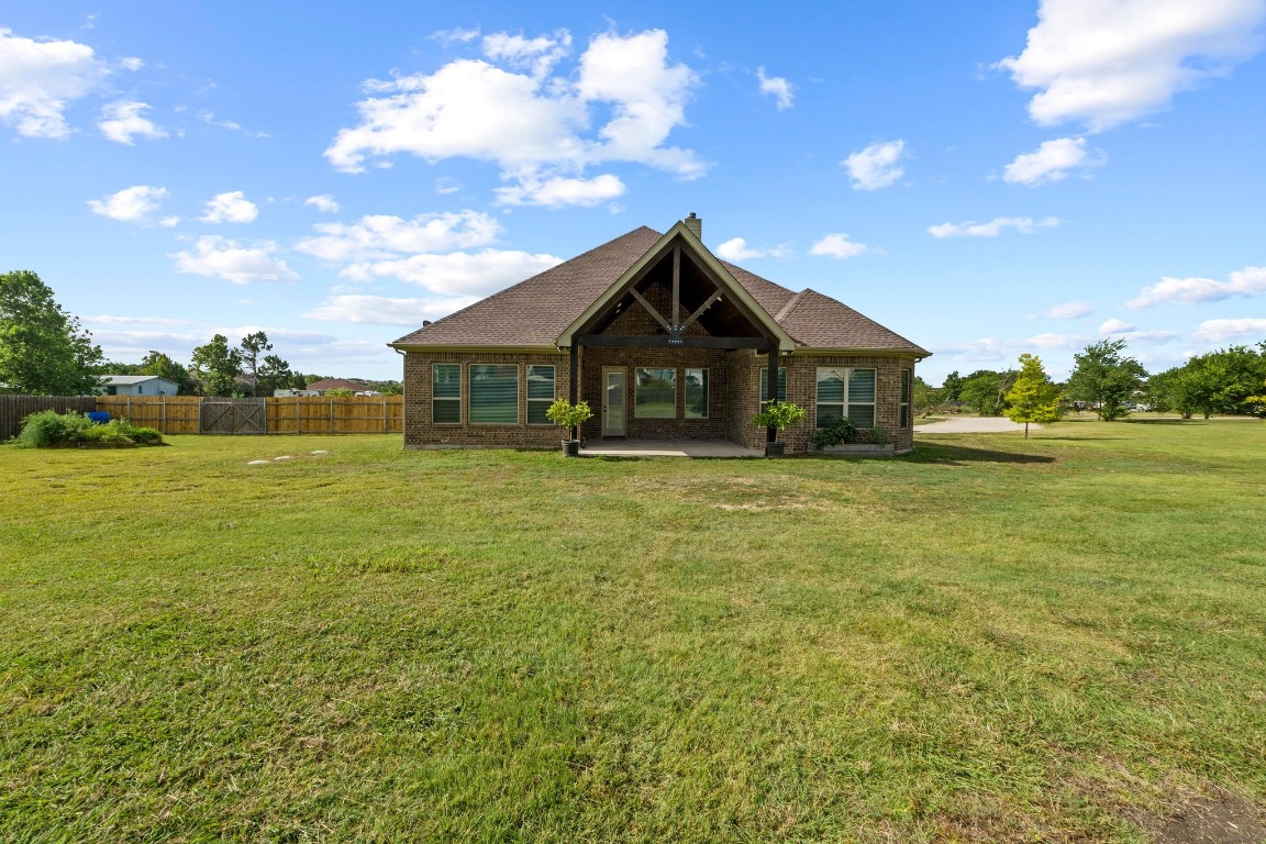 200 Tate Lane Round Rock, TX 78665 - Photo 31 of 40 a view of a house with a yard
