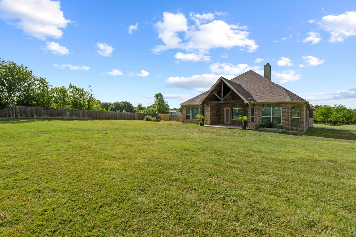 200 Tate Lane Round Rock, TX 78665 - Photo 32 of 40 a front view of house with an outdoor space and balcony